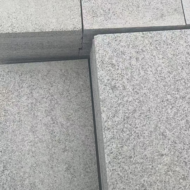 大连芝麻白地铺石石材厂家